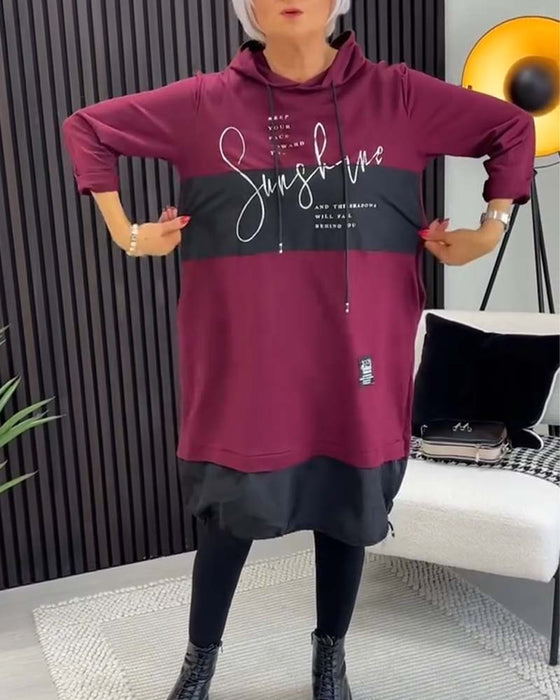 Afslappet hættekjole med skift