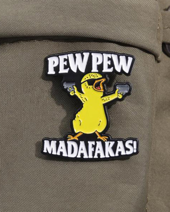 Broche med Bogstav & Tegneserie And Design