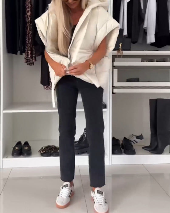 Vatteret vest med hætte og lynlås