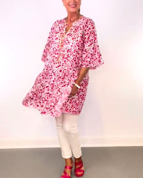 Lang blomsterbluse i løs pasform