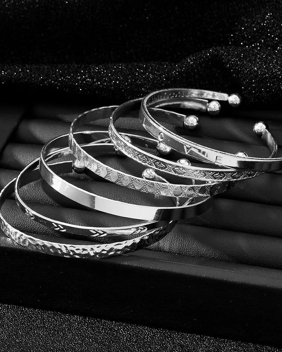 Guld armbåndssæt i 7 dele