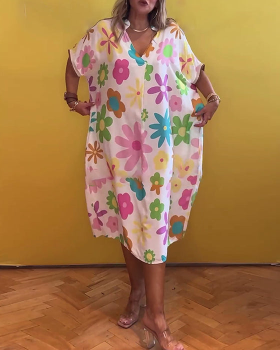 Sød blomsterkjole i løs pasform