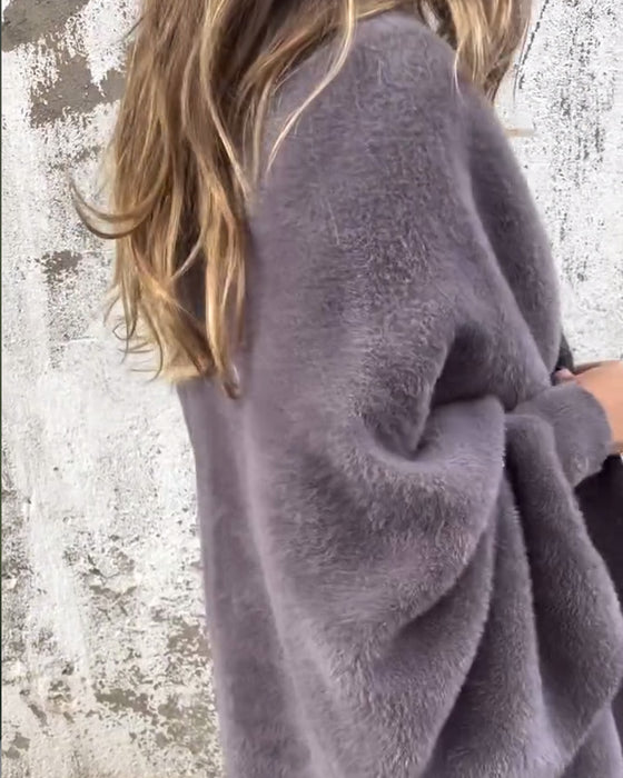 Pelsfrakke med frynser