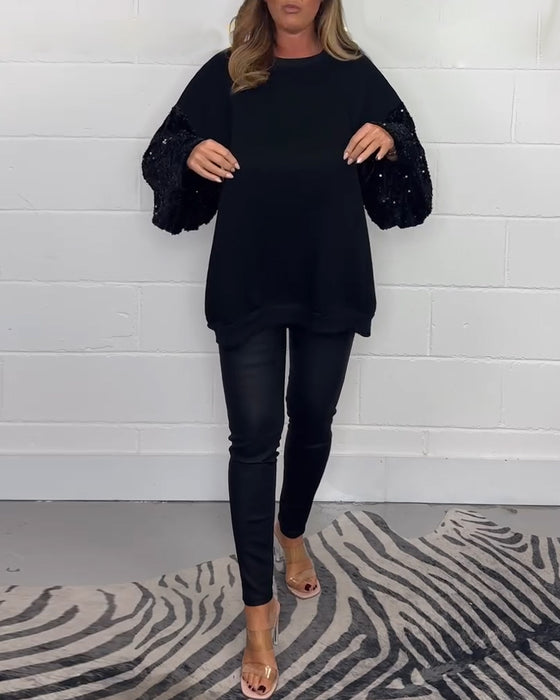 Sort sweater i afslappet pasform