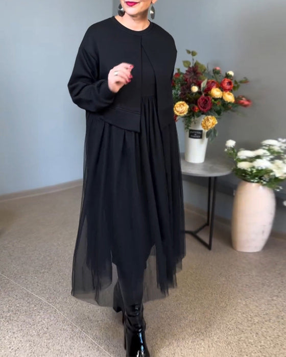 Elegant kjole med gennemsigtigt yderlag