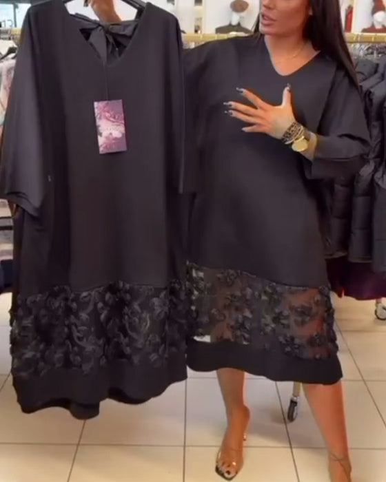 Stilfuld Kjole Med Sløjfe På Bagsiden Og V-Hals