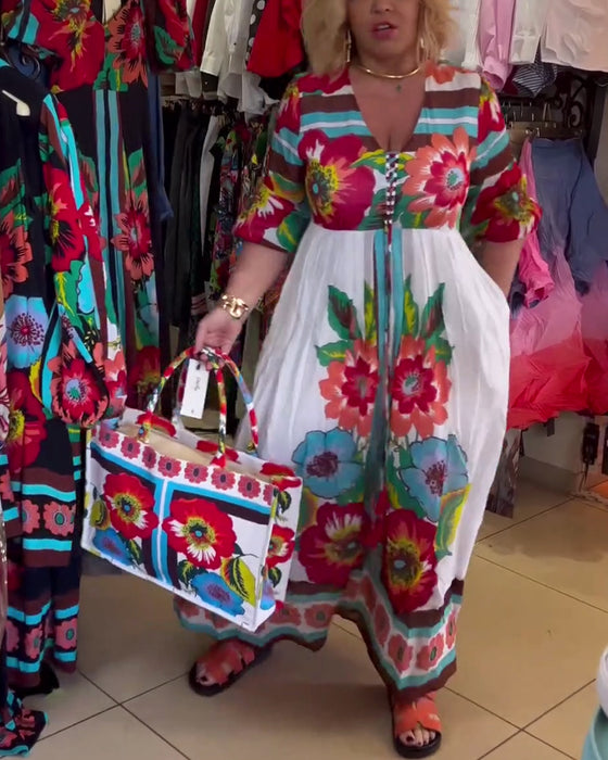 Lang blomsterkjole med svaj