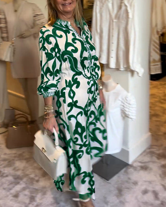 Mønstret kjole i løs pasform med V-hals