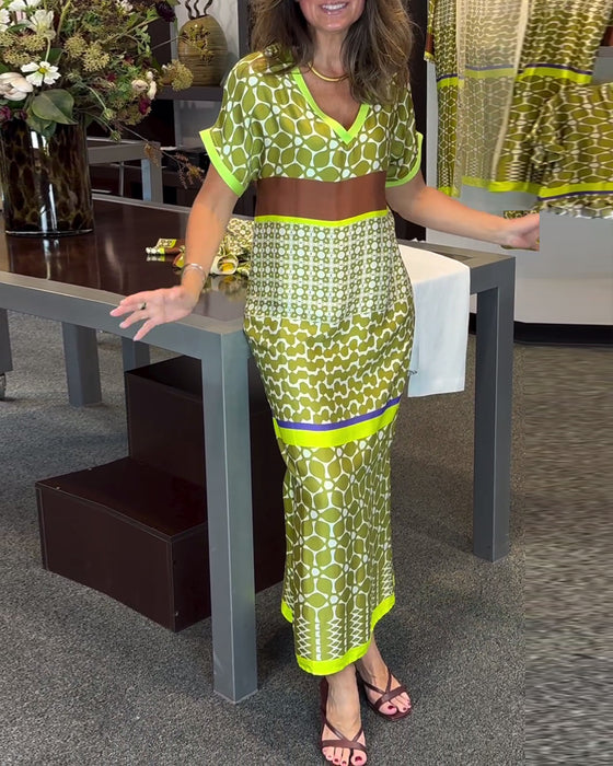 Lang kjole med V-udskæring og kontrastprint