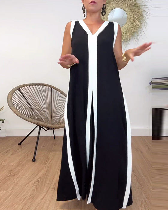 Sort kjole uden ærmer med kontrasterende hvide kanter