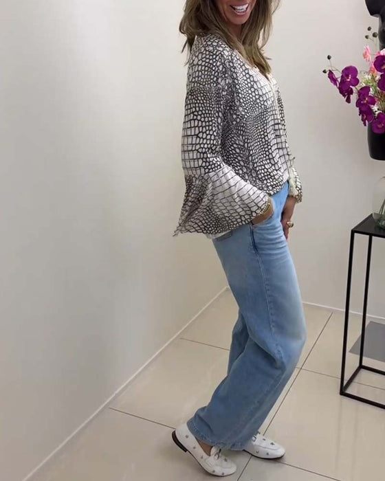 Bluse med frynser og vide ærmer