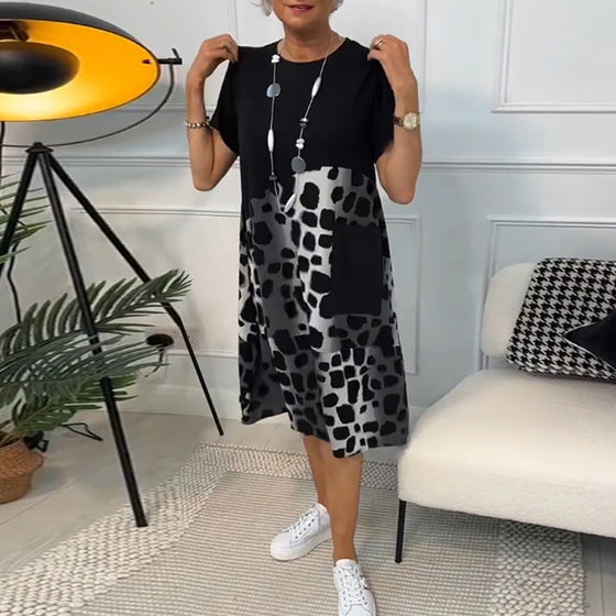 Sort patchwork kjole med rund halsudskæring