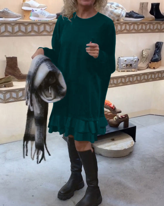 Kjole med elegant silhuet og lange ærmer