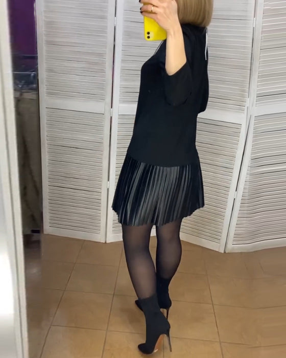 Kjole med plisserede paneler