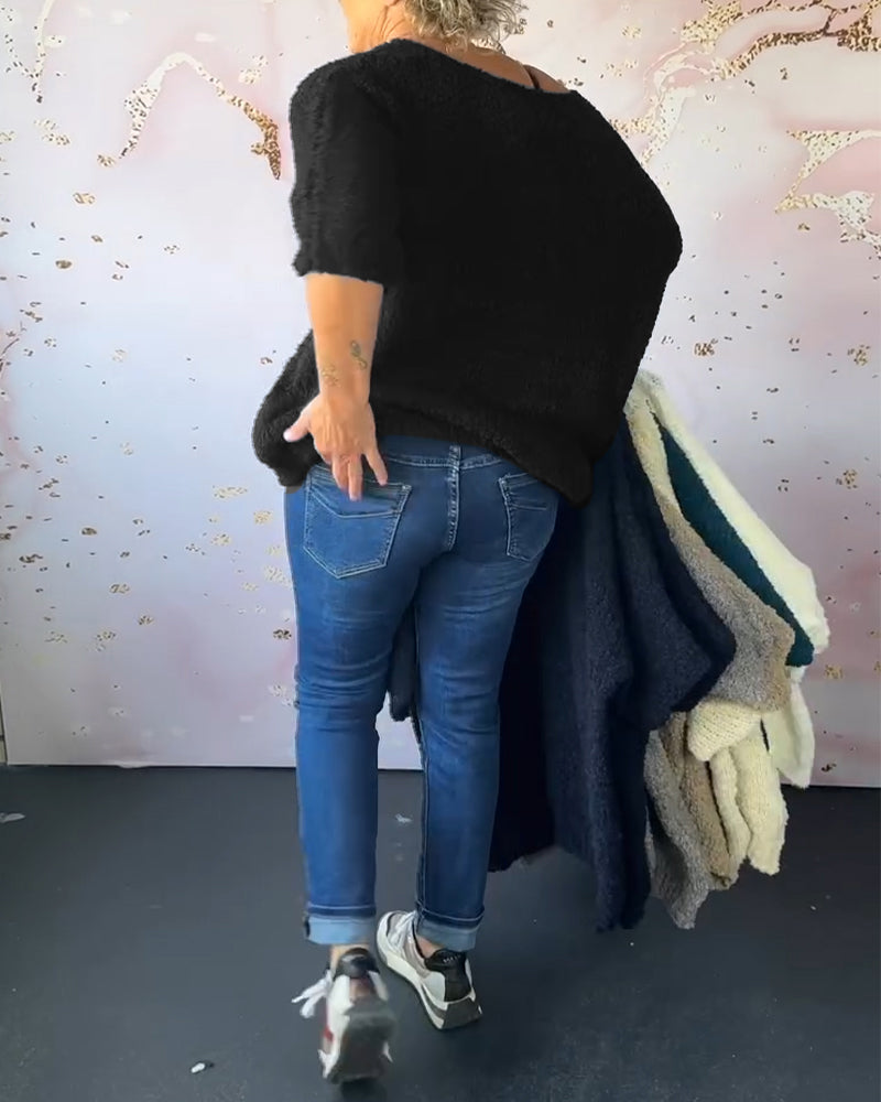 Ensfarvet sweater i løs pasform