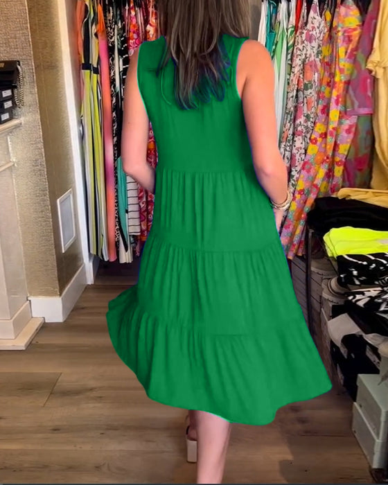 Blå ærmeløs kjole med plisseret nederdel