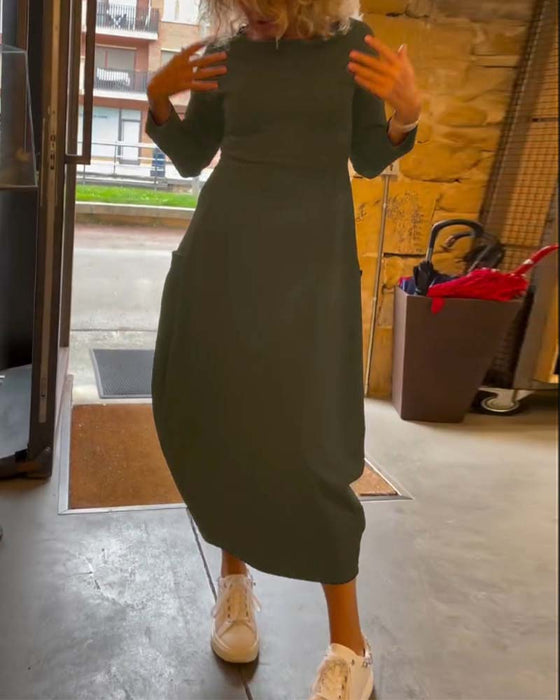 Langærmet sort kjole med lommer