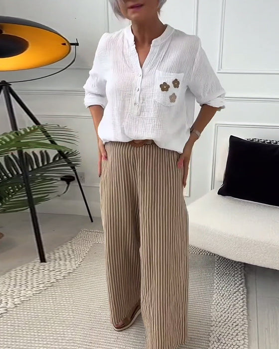 Afslappet langærmet bluse med brystlomme