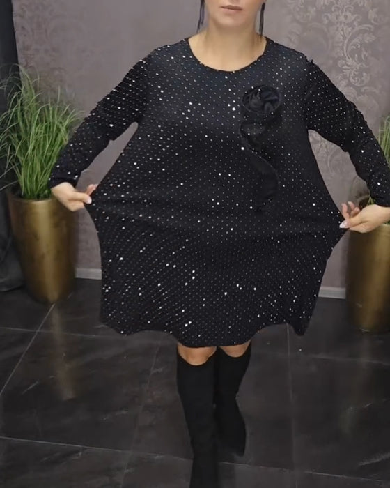 Skinnende aftenkjole med lange ærmer