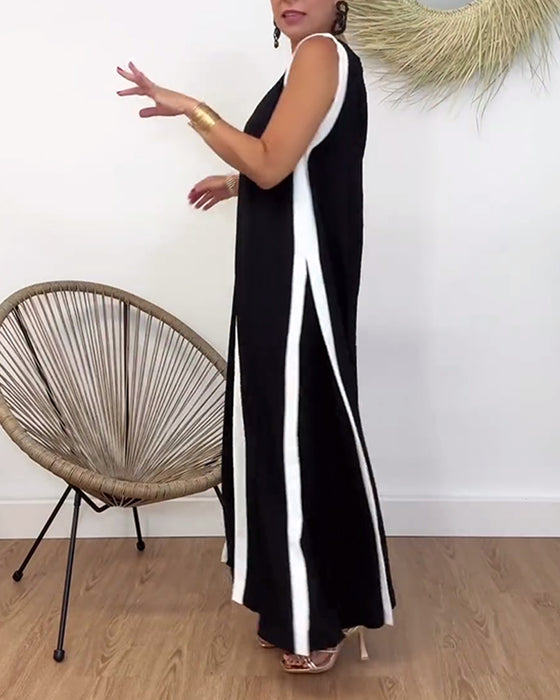 Sort kjole uden ærmer med kontrasterende hvide kanter