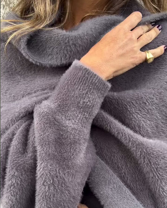 Pelsfrakke med frynser