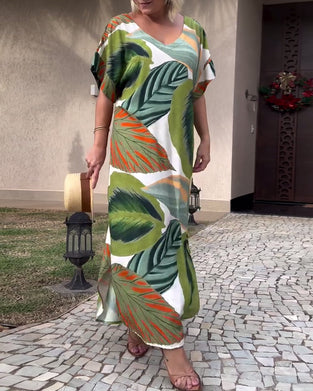Afslappet kjole med korte ærmer og botanisk print