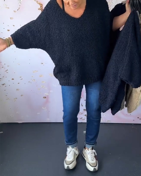 Ensfarvet sweater i løs pasform