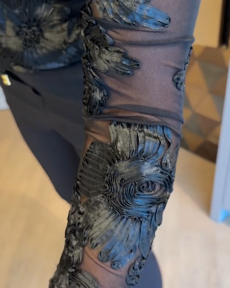 Stilfuld Top Med Rund Hals Og Lange Ærmer