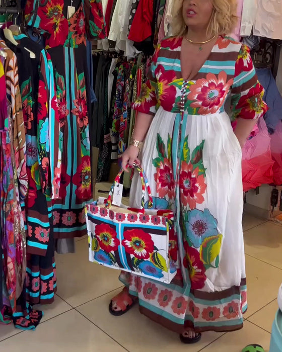 Lang blomsterkjole med svaj