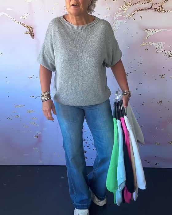 Løs ensfarvet pullover med rund hals