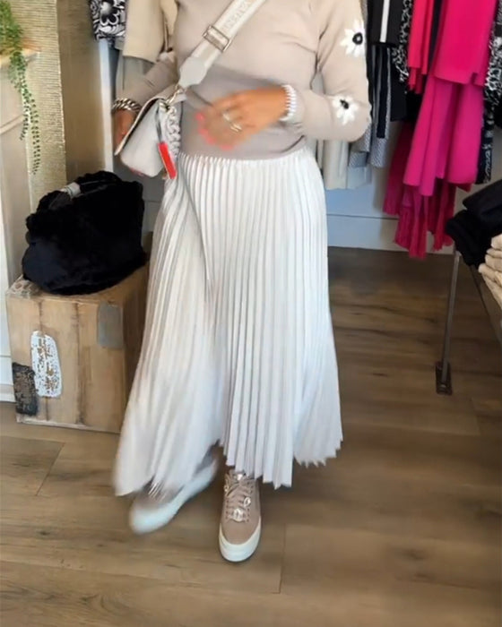 Plisseret ensfarvet kjole