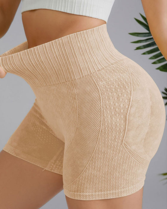 Simple ensfarvede højtaljede shorts