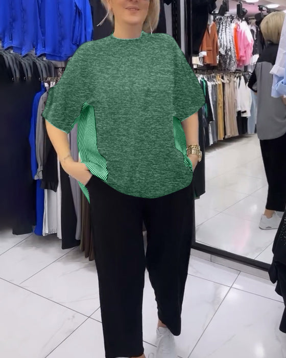 Afslappet sort bluse med nålestribet ryg