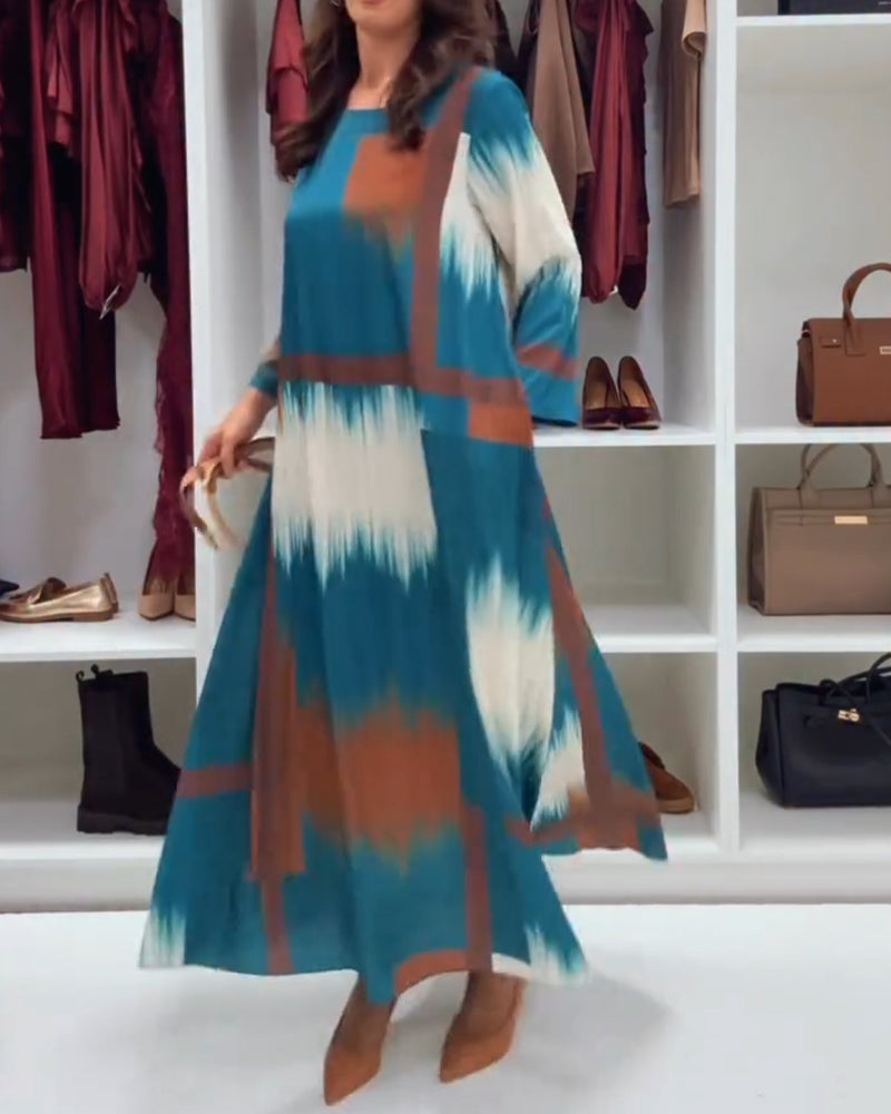 Moderne Trykt Kjole Med Rund Halsudskæring Og Lange Ærmer