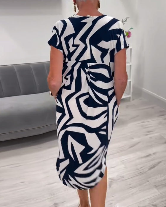 V-halset kortærmet kjole med print