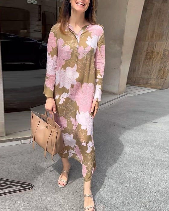 Lang blomsterkjole med slids og lange ærmer