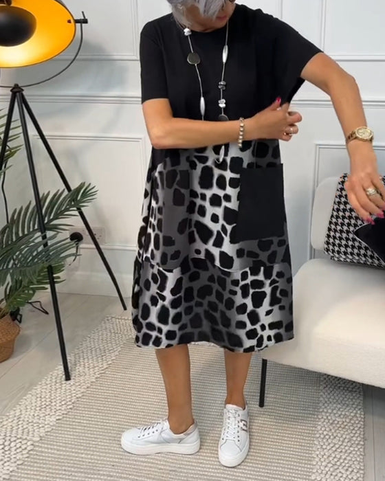 Sort patchwork kjole med rund halsudskæring