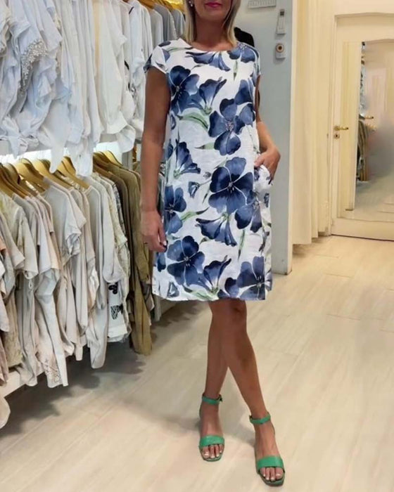 Knælang blomsterkjole med korte ærmer