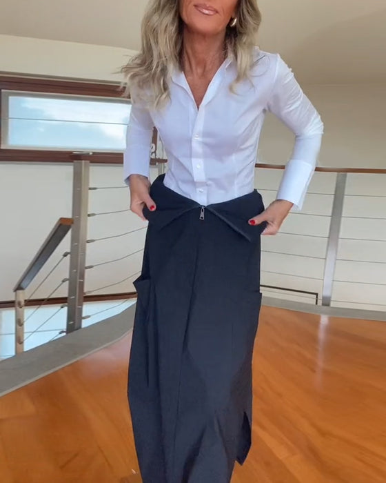 Stilfuld mørk nederdel med lynlåslommer