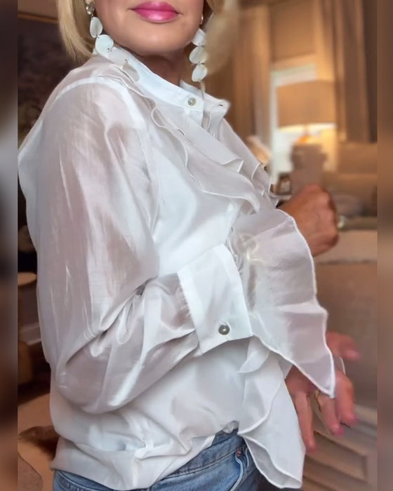 Elegant bluse med ensfarvet flæse