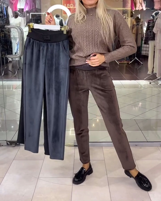 Simple ensfarvede varme og behagelige fløjlsbukser