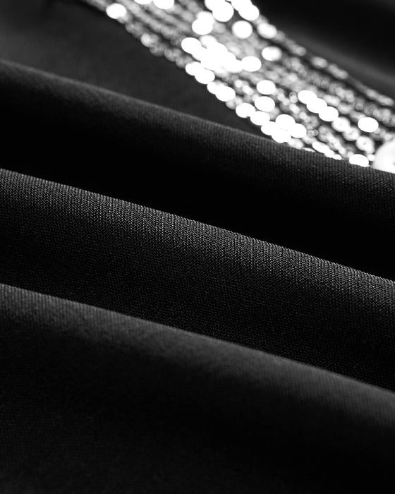 Afslappet top med pailletter