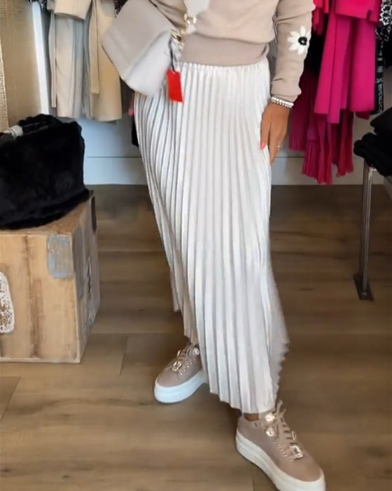 Plisseret ensfarvet kjole