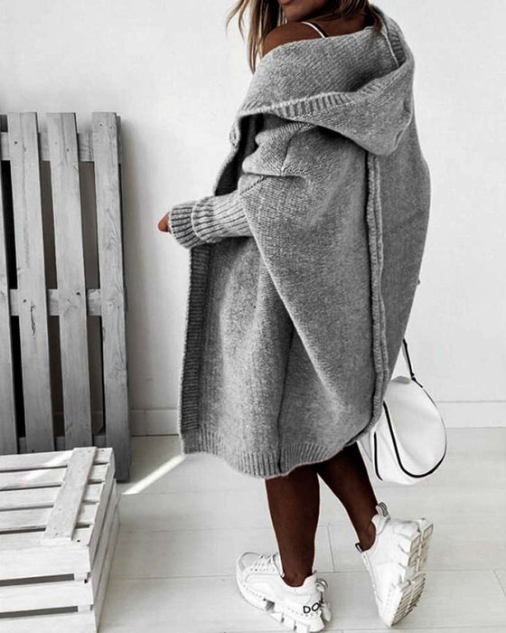 Oversized ensfarvet frakke