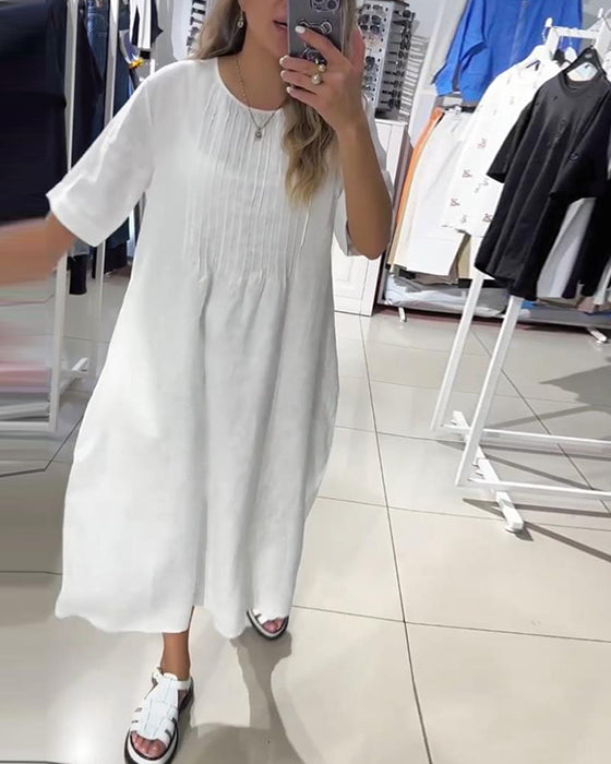 Afslappet ensfarvet kjole i bomuld og hør