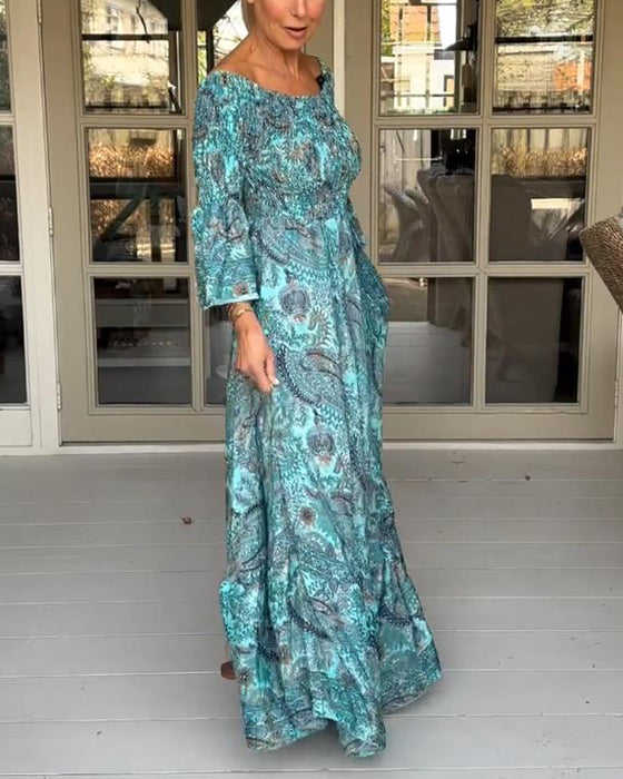 Lang kjole med paisley print og vide ærmer