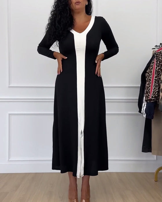 Elegant kjole med v-udskæring og hvid midterstribe