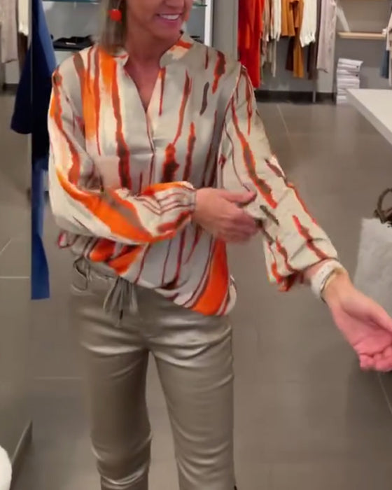 Langærmet bluse med stribet print