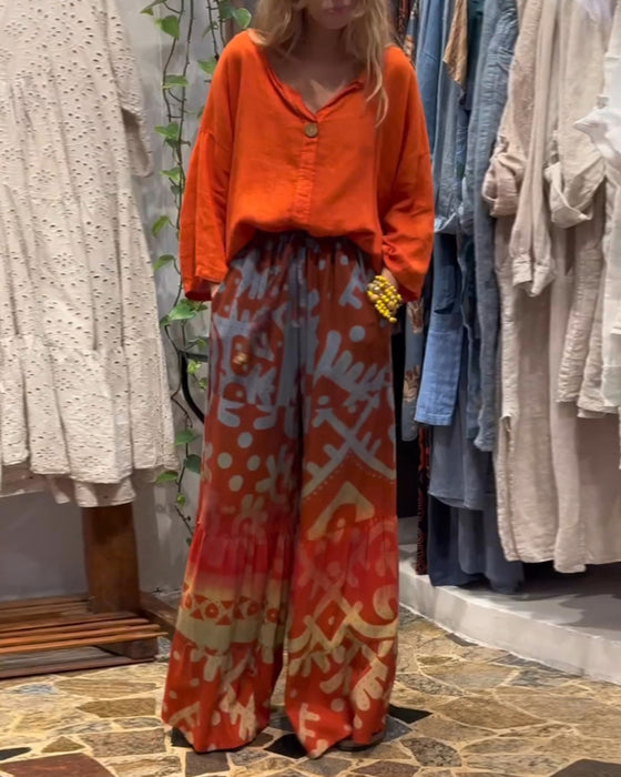 Bredbenede bukser i løs pasform med lommer og print