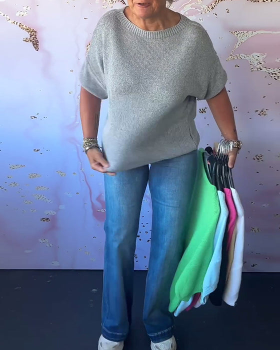 Løs ensfarvet pullover med rund hals